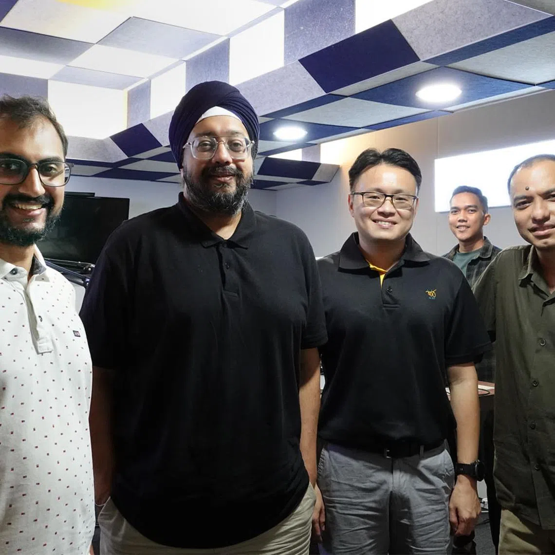 (From left) ComLink+ volunteer Manas Gupta, foster home volunteer Malminderjit Singh and Mr Lim Teck Kiat, a senior director in policy from Ministry of Social & Family Devt, ST's podcast producer Amirul Karim (back), and podcast editor Ernest Luis.