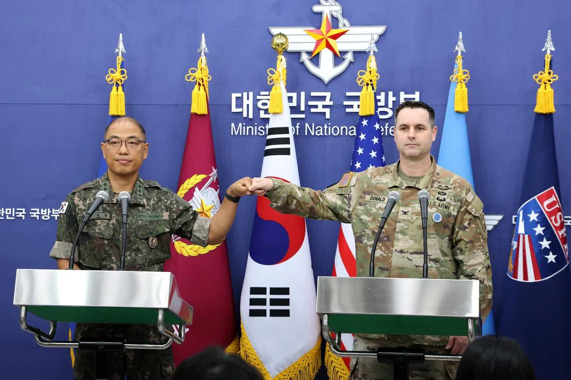 SEOUL, SOUTH KOREA - AUGUST 7: (L to R) Col. Lee Sung-jun, public affairs director of South Korea's Joint Chiefs of Staff and Col. Ryan Donald, public affairs director of the United Nations Command (UNC), Combined Forces Command (CFC), and United States Forces Korea (USFK) attend the press briefing of Ulchi Freedom Shield 2025 exercise at the Defense Ministry on August 07, 2025 in Seoul, South Korea. The 11-day Freedom Shield is part of an annual combined training with troops from South Korea and the United States. Chung Sung-Jun/Pool via REUTERS