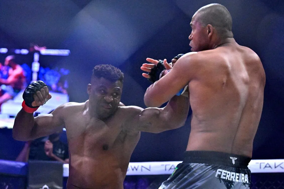 Francis Ngannou (left) competing with Renan Ferreira during the PFL Super Fights: Battle of the Giants mixed martial arts event in Riyadh on Oct 19. Ngannou landed a series of bludgeoning punches to end the fight with 88 seconds left in the first round.