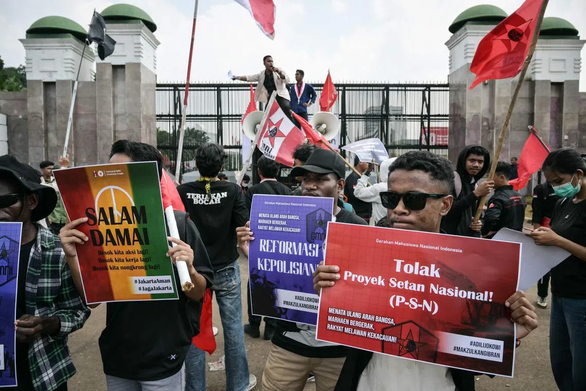 University students protesting outside the parliament complex in Jakarta on Sept 1.