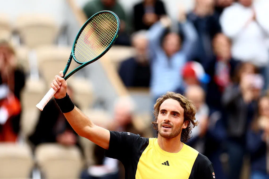 Tennis - French Open - Roland Garros, Paris, France - May 27, 2024 Greece's Stefanos Tsitsipas celebrates after winning his first round match against Hungary's Marton Fucsovics REUTERS/Lisi Niesner