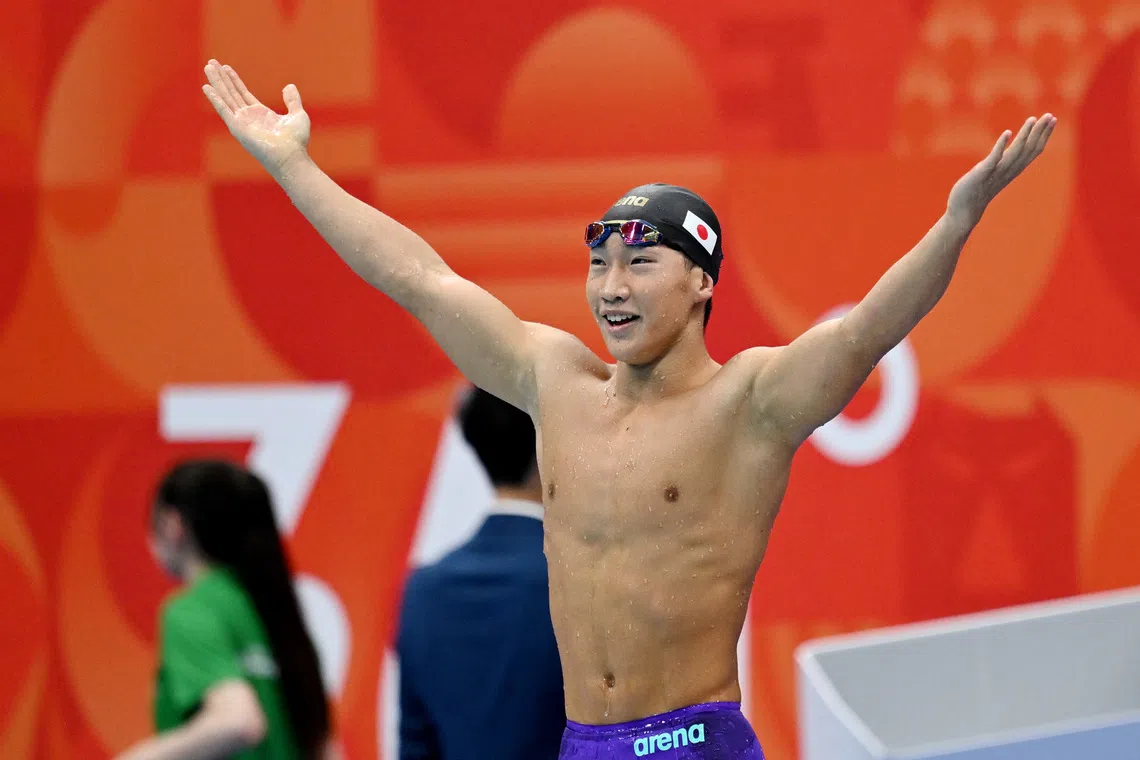 Asian Games - Aichi-Nagoya 2026 - Swimming - Tokyo Aquatics Centre, Koto, Tokyo, Japan - September 24, 2026 Japan's Shin Ohashi celebrates winning gold in the Men's 200m Breaststroke Final REUTERS/Andy Chua