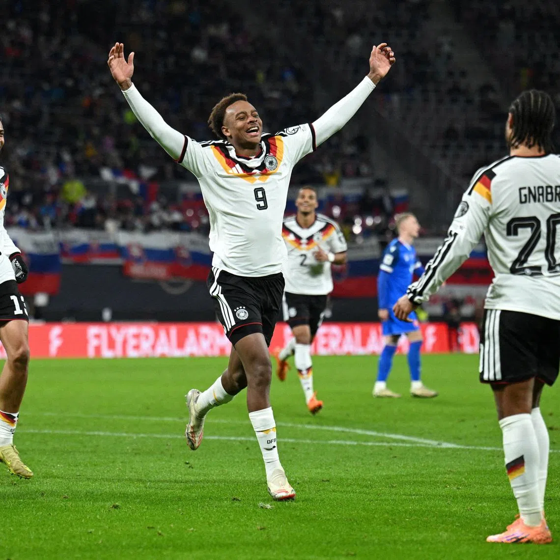 Soccer Football - World Cup - UEFA Qualifiers - Group A - Germany v Slovakia - Red Bull Arena, Leipzig, Germany - November 17, 2025 Germany's Assan Ouedraogo celebrates scoring their sixth goal REUTERS/Annegret Hilse