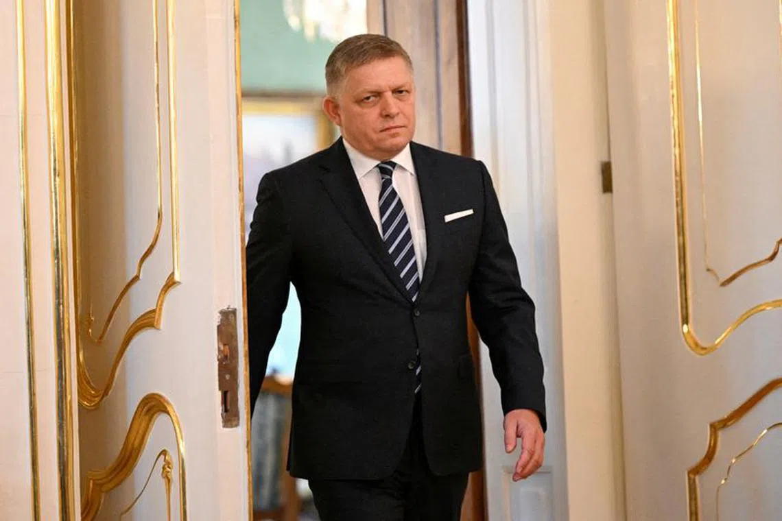 FILE PHOTO: Then designated Prime Minister Robert Fico walks on the day of the new cabinet's inauguration at the Presidential Palace in Bratislava, Slovakia, October 25, 2023. REUTERS/Radovan Stoklasa/File Photo