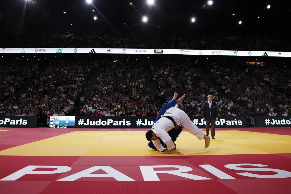A judo match at the Accor Arena in Paris, which will be used for badminton at the 2024 Summer Olympics.