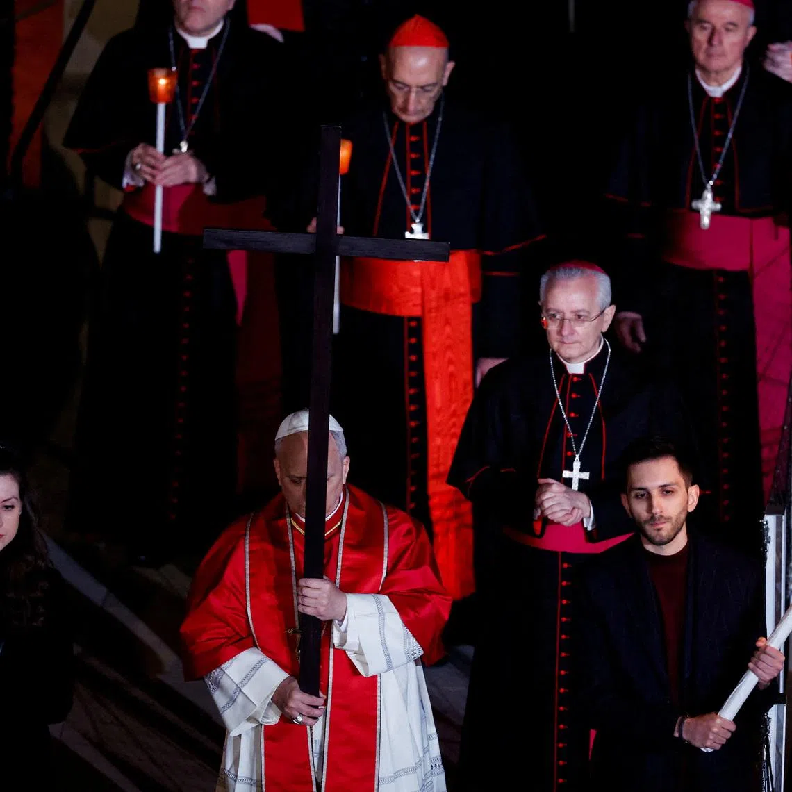 Pope Leo XIV presides over the Via Crucis (Way of the Cross) procession during Good Friday celebrations, at the Colosseum, in Rome, Italy, April 3, 2026. REUTERS/Remo Casilli
