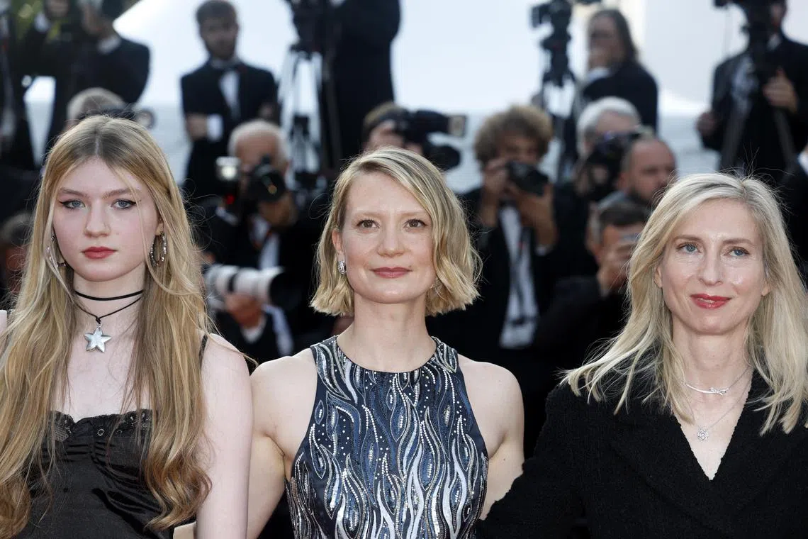 (From left) Florence Baker, Mia Wasikowska, and director Jessica Hausner arrive for the screening of Club Zero during the 76th annual Cannes Film Festival, in Cannes, France, on May 22 2023. 
