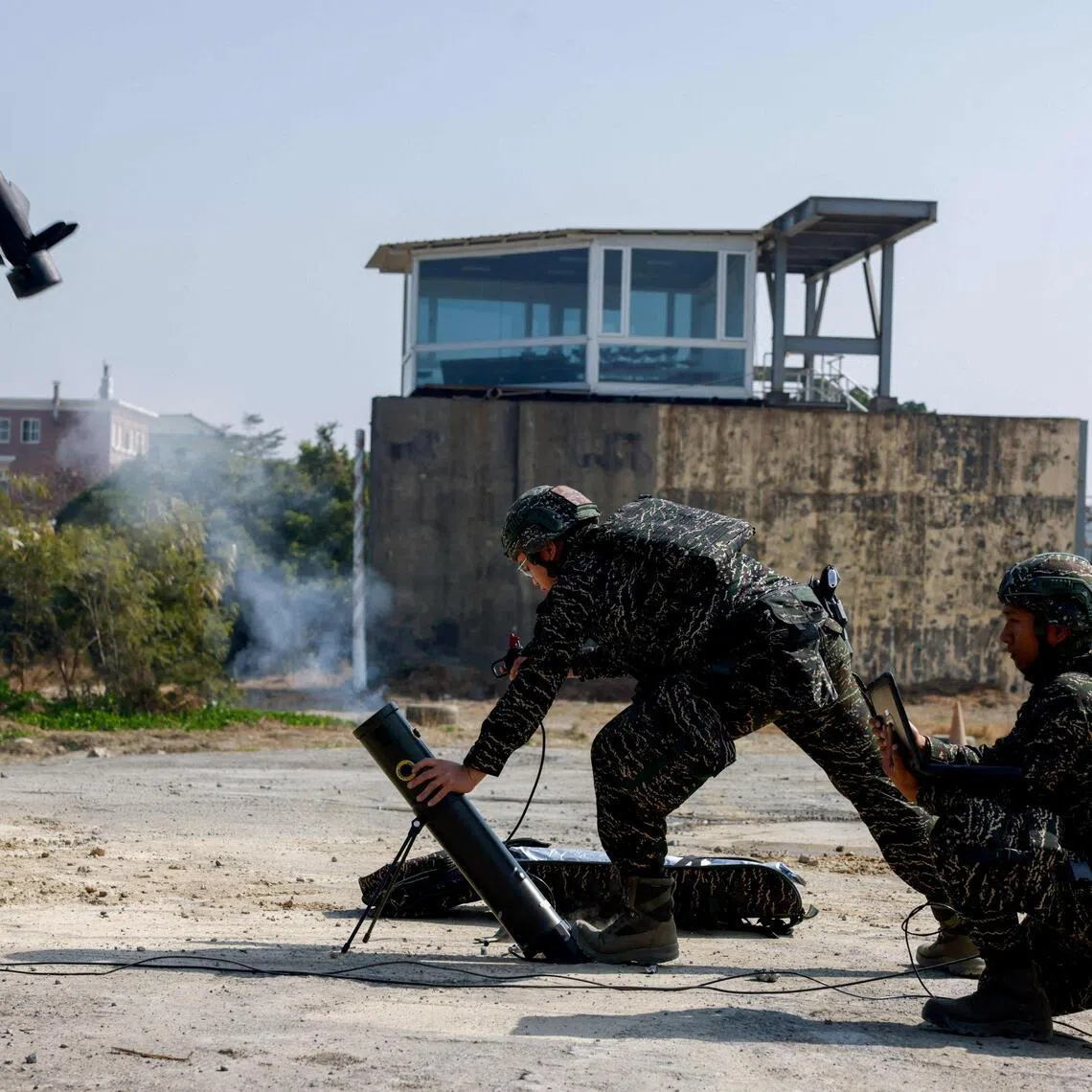 Soldiers operate a Taiwan-made attack drone during an annual military exercise in Kaohsiung on Jan 29.