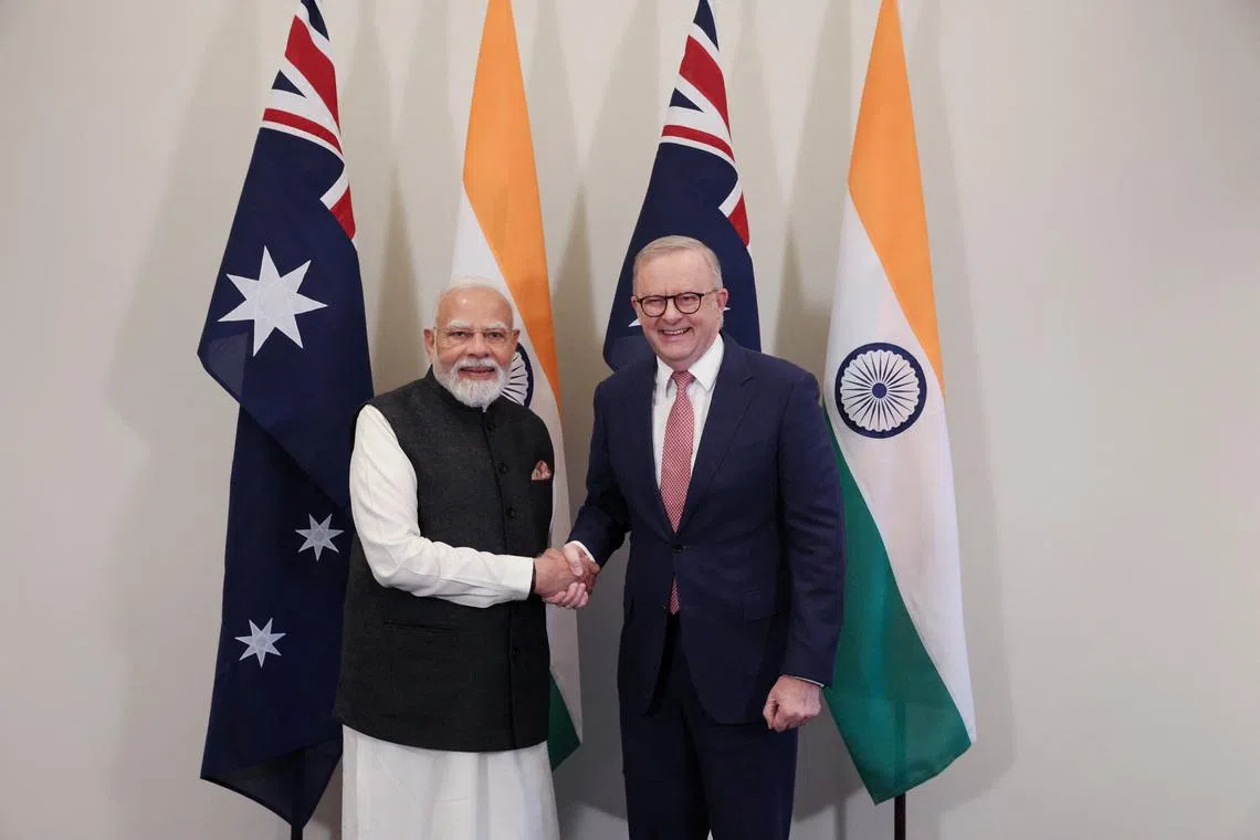Australian Prime Minister Anthony Albanese and Indian Prime Minister Narendra Modi shake hands ahead of the CEO Forum and Economic Roadmap Business Reception in Melbourne, Australia, July 9, 2026.  REUTERS/Hollie Adams