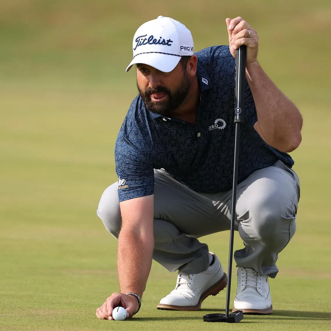 Jul 16, 2026; Southport, ENG; Matthew Baldwin lines up a putt on the eighth green during the first round of The Open Championship golf tournament at Royal Birkdale. Mandatory Credit: Bill Streicher-Imagn Images
