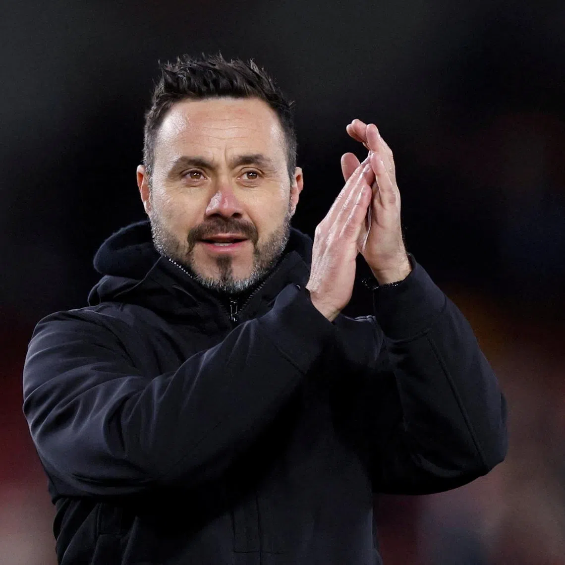 FILE PHOTO: Soccer Football - Premier League - Brentford v Brighton & Hove Albion - Brentford Community Stadium, London, Britain - April 3, 2024 Brighton & Hove Albion manager Roberto De Zerbi applauds fans after the match Action Images via Reuters/Peter Cziborra/File Photo