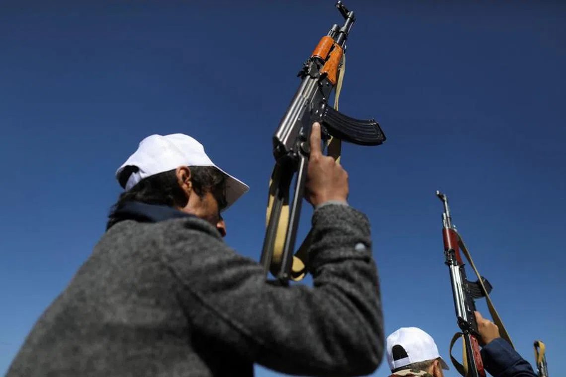 Newly recruited fighters who joined a Houthi military force intended to be sent to fight in support of the Palestinians in the Gaza Strip, march during a parade in Sanaa, Yemen December 2, 2023. REUTERS/Khaled Abdullah/ File Photo
