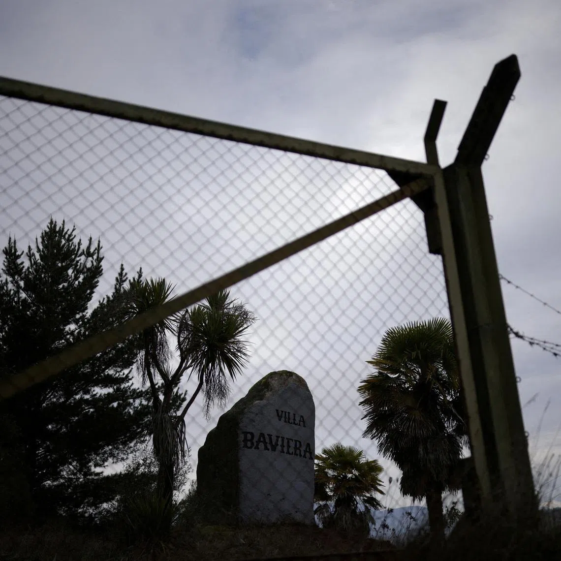FILE PHOTO: The name of Villa Baviera, formerly Colonia Dignidad, is engraved on a stone at the settlement created by German immigrants that served as a secret prison during Augusto Pinochet's dictatorship (1973-1990), on the outskirts of Parral, Chile, July 20, 2025. REUTERS/Pablo Sanhueza/File Photo
