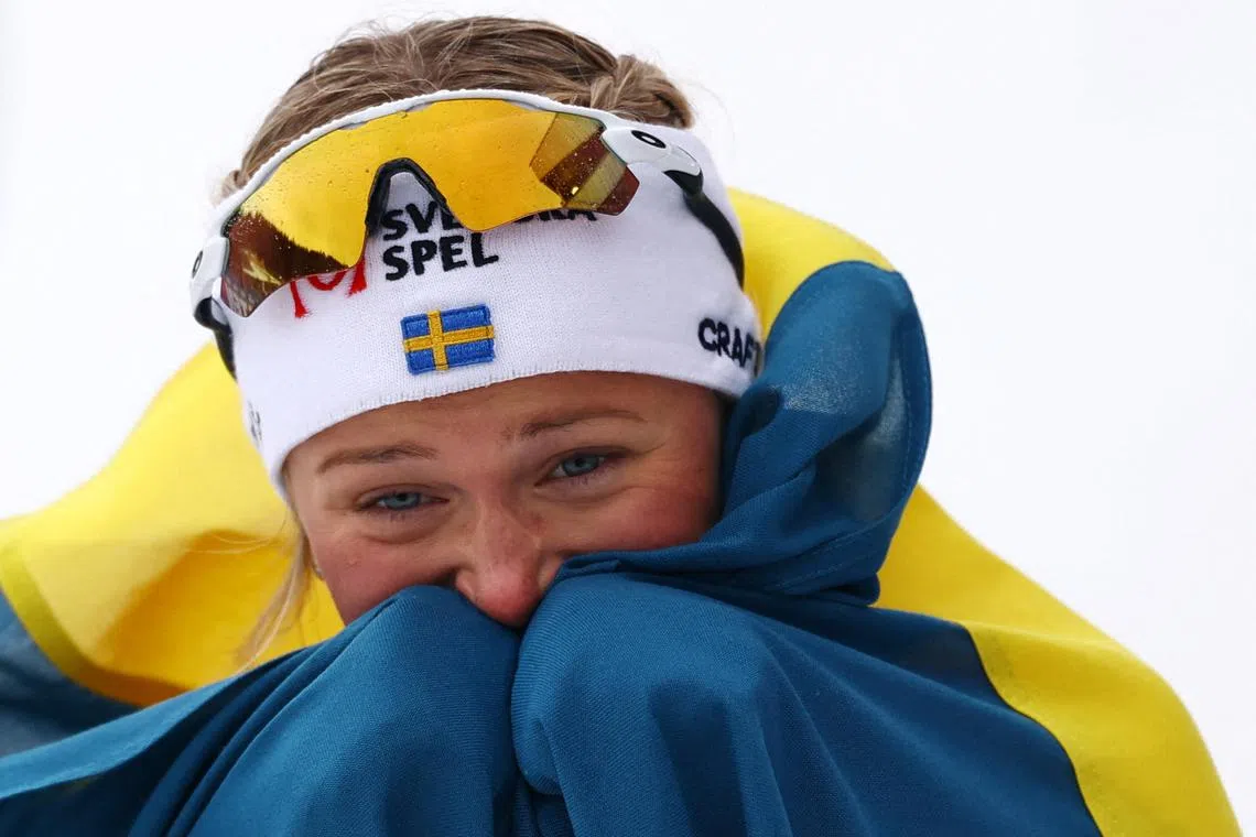 Nordic Skiing - FIS Nordic World Ski Championships - Trondheim, Norway - March 9, 2025 Sweden's Frida Karlsson celebrates winning the Women's 50km Mass Start Free REUTERS/Kai Pfaffenbach