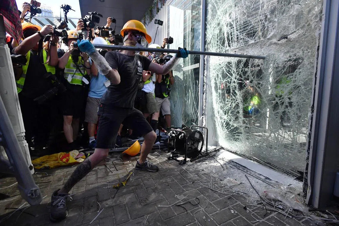 Hundreds of protesters broke into the legislature on the night of July 1, 2019 – the 22nd anniversary of Hong Kong’s handover from Britain to China – smashing windows and spraying graffiti.