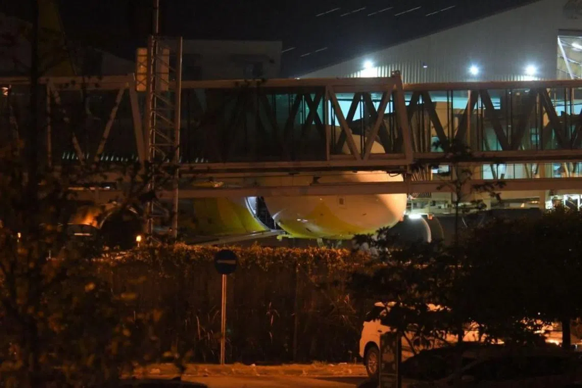 It is believed the plane carrying 92 crew members and passengers had encountered problems to its left engine during the flight. 