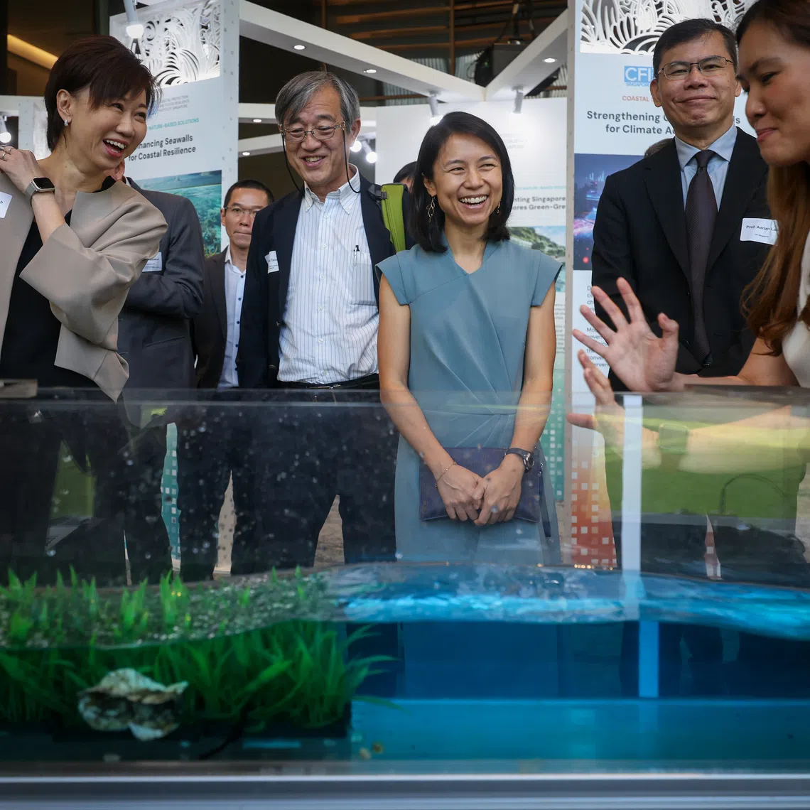 Senior Parliamentary Secretary for Sustainability and the Environment Goh Hanyan (centre) at the CFI Symposium in NUS on Sept 18.