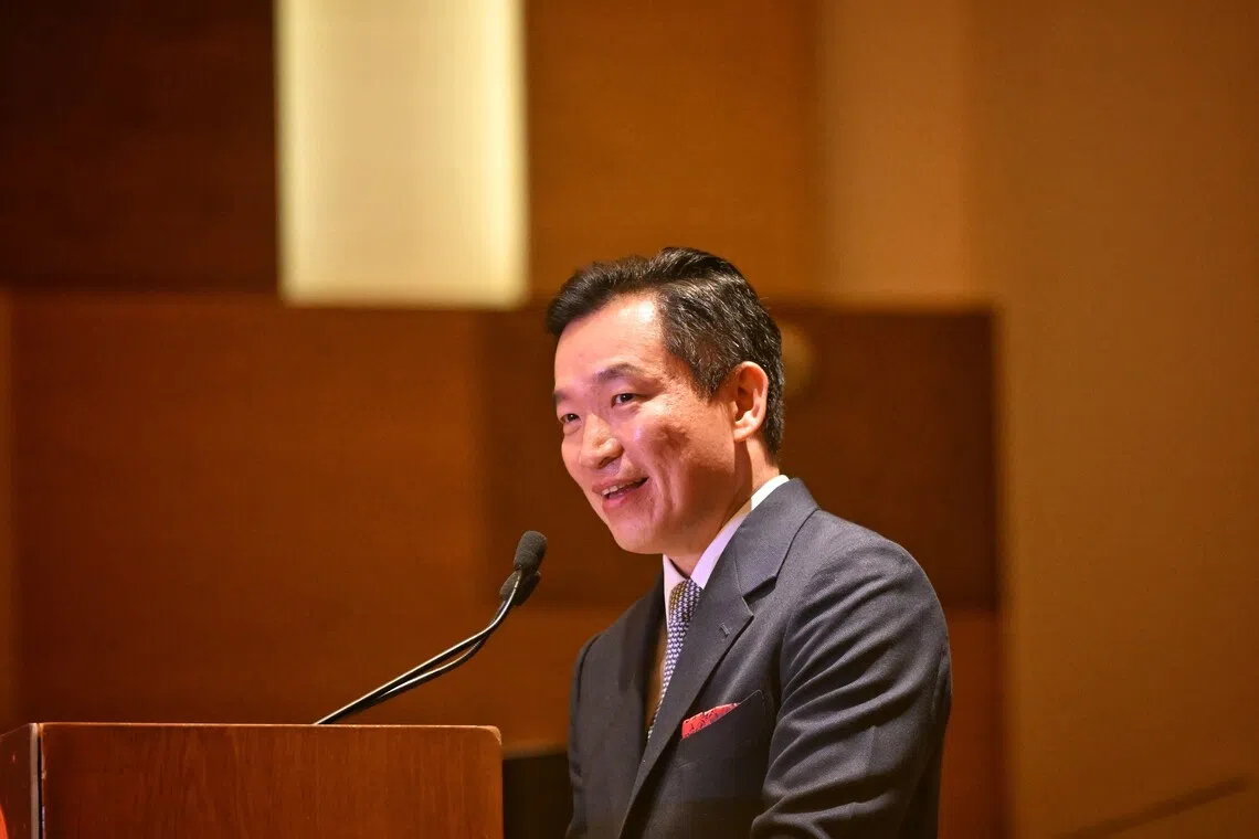 Senior Parliamentary Secretary for Social and Family Development Eric Chua speaking at the Community Chest’s annual award ceremony on Oct 8.