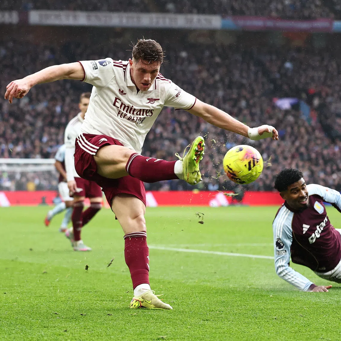 Soccer Football - Premier League - Aston Villa v Arsenal - Villa Park, Birmingham, Britain - December 6, 2025 Arsenal's Viktor Gyokeres in action with Aston Villa's Ian Maatsen REUTERS/David Klein