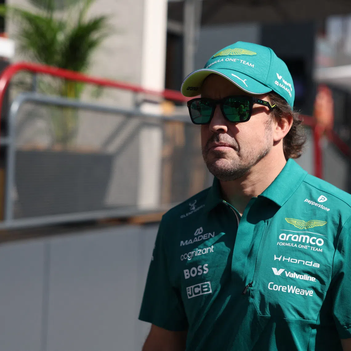 Formula One F1 - Azerbaijan Grand Prix - Baku City Circuit, Baku, Azerbaijan - September 26, 2026 Aston Martin's Fernando Alonso arrives ahead of the race REUTERS/Jakub Porzycki