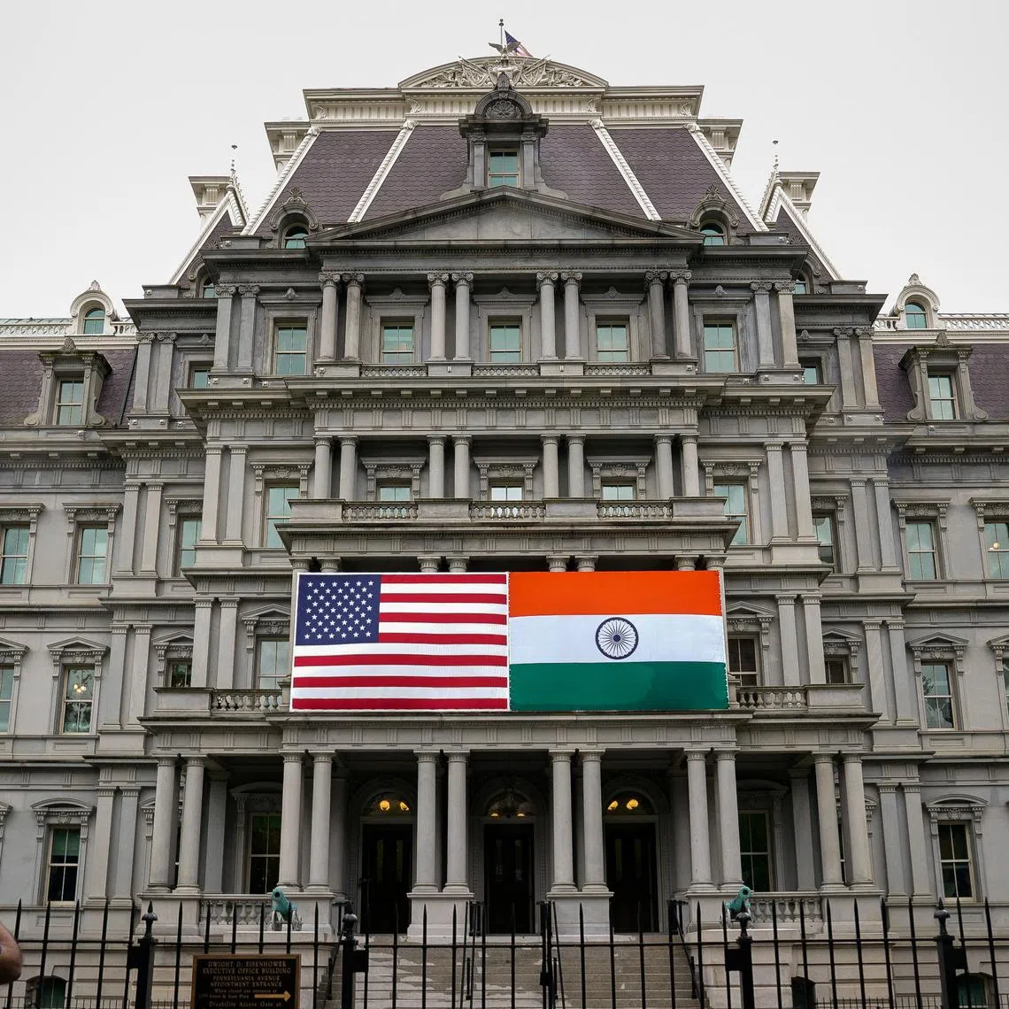 FILE PHOTO: The flags of the United States and India are displayed on the Eisenhower Executive Office Building at the White House in Washington, U.S., June 21, 2023. REUTERS/Elizabeth Frantz/File Photo