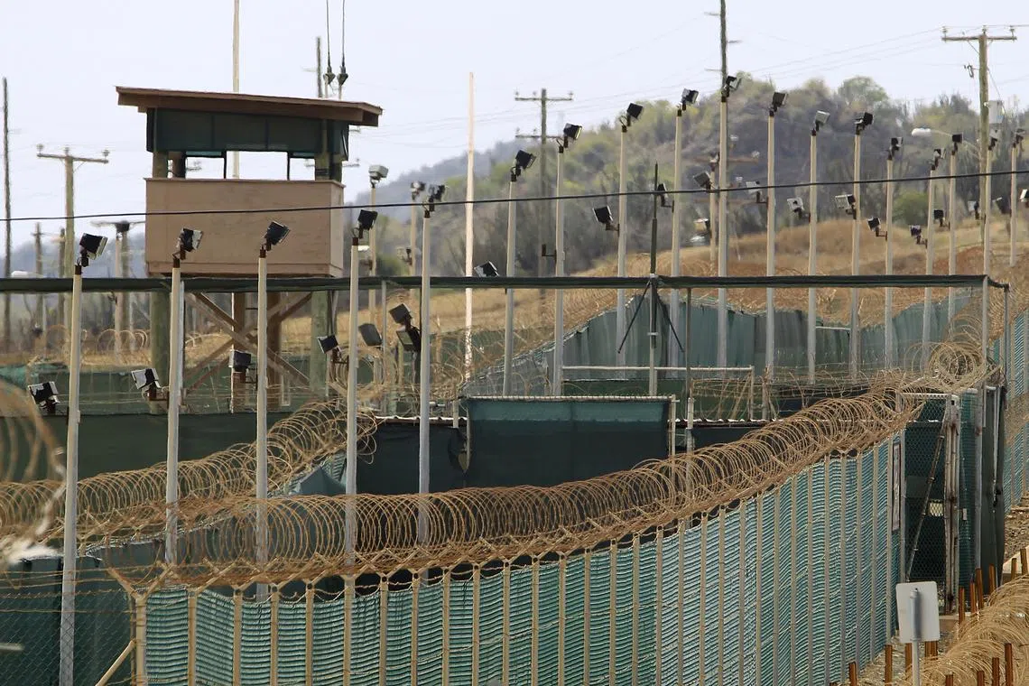 FILE PHOTO: The exterior of Camp Delta is seen at the U.S. Naval Base at Guantanamo Bay, March 6, 2013. The facility is operated by the Joint Task Force Guantanamo and holds prisoners who have been captured in the war in Afghanistan and elsewhere since the September 11, 2001 attacks. Picture taken March 6, 2013.  REUTERS/Bob Strong/File Photo