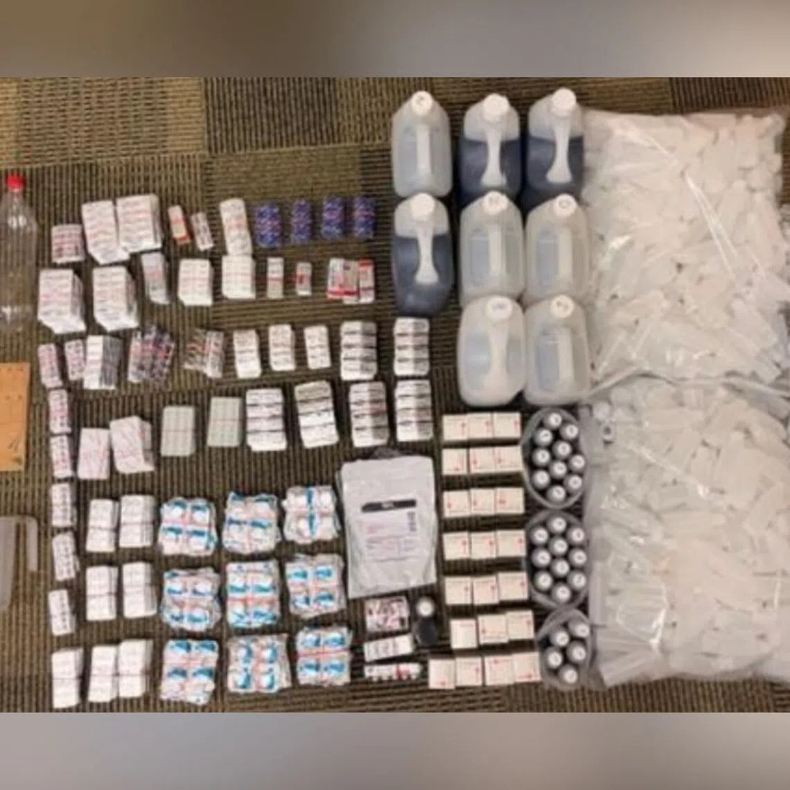 More than 31 litres of illegal cough syrup and 5,200 units of addictive prescription medicines were seized.