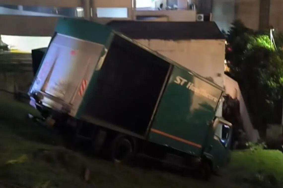 In a video posted on TikTok, a tow truck can be seen pulling the lorry up the steep slope and back onto the road.