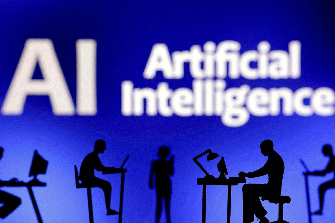 FILE PHOTO: Figurines with computers and smartphones are seen in front of the words "Artificial Intelligence AI" in this illustration taken, February 19, 2024. REUTERS/Dado Ruvic/Illustration//File Photo