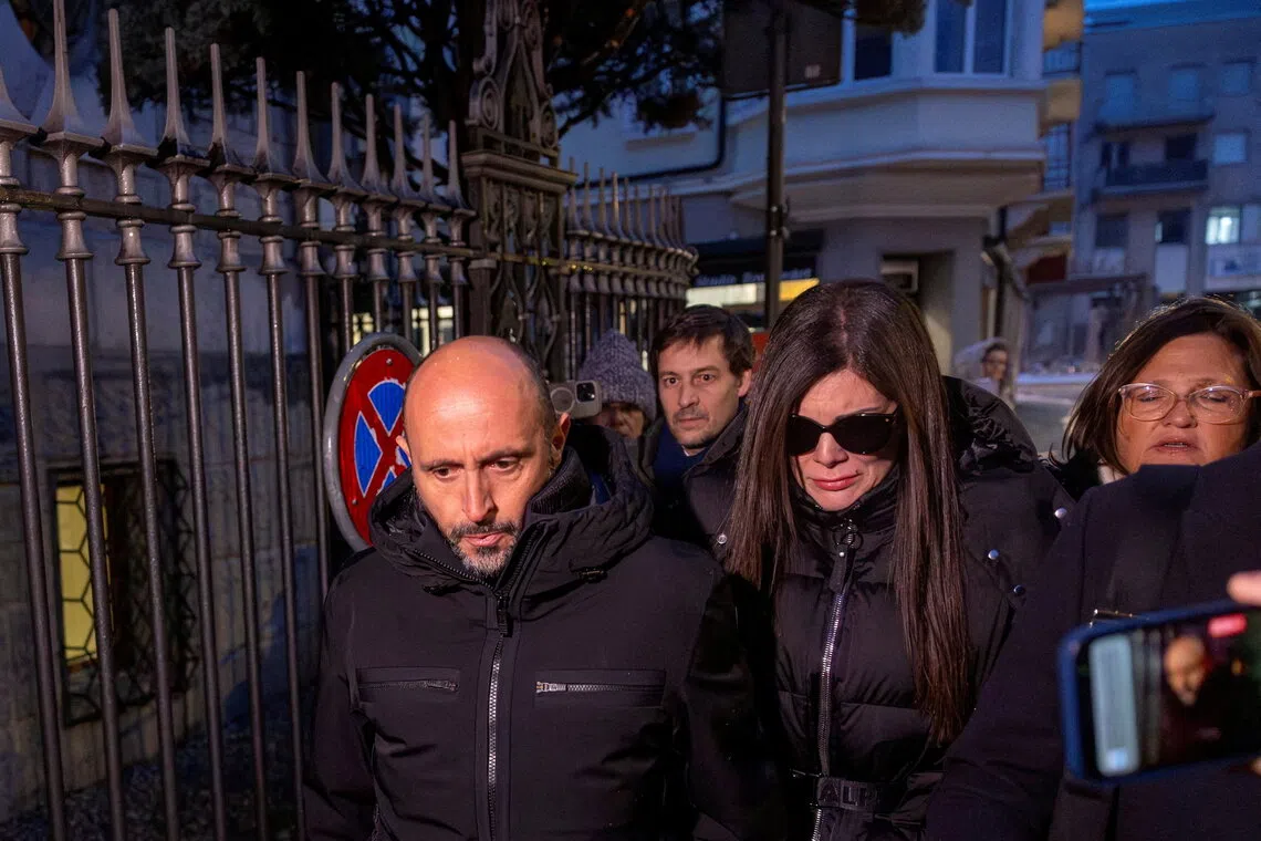 Owner of Swiss bar in deadly blaze held for domestic abuse, report says