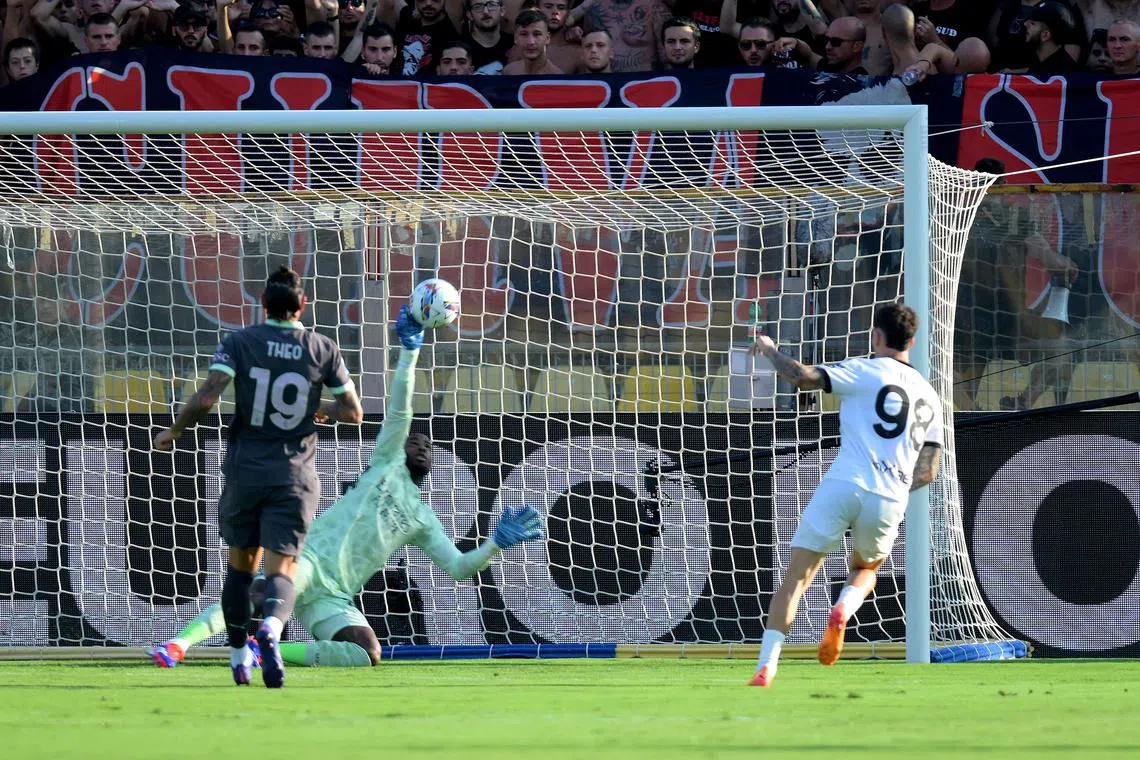 Soccer Football - Serie A - Parma v AC Milan - Stadio Ennio Tardini, Parma, Italy - August 24, 2024 Parma's Dennis Man scores their first goal REUTERS/Daniele Mascolo