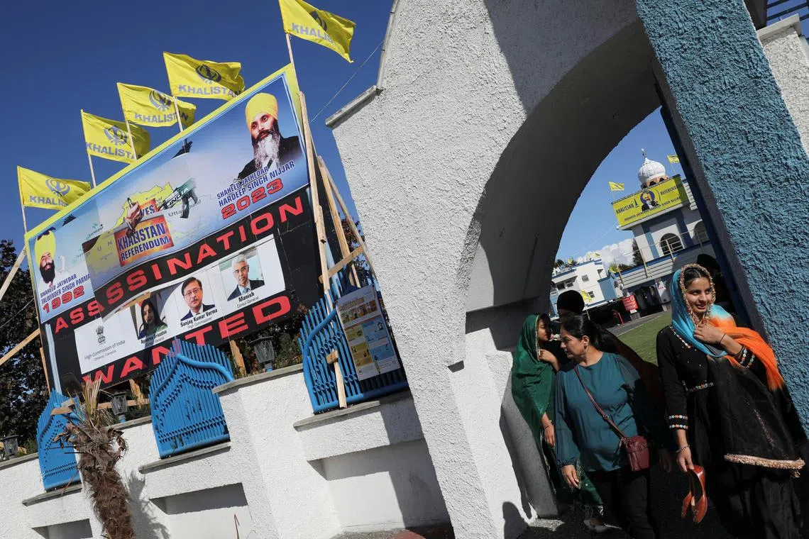 A sign outside the Guru Nanak Sikh Gurdwara temple is seen after the killing of Sikh leader Hardeep Singh Nijjar on its grounds in June 2023.