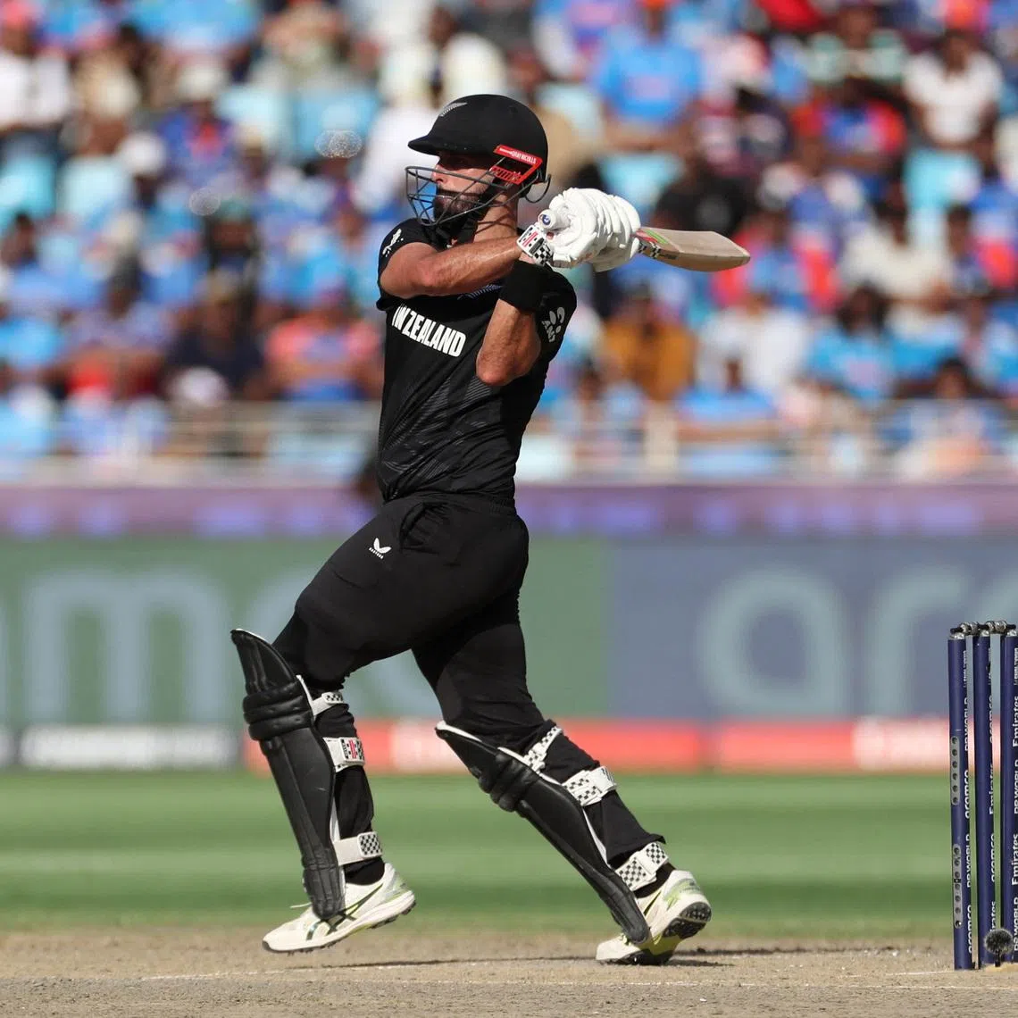 Cricket - ICC Men's Champions Trophy - Final - India v New Zealand - Dubai International Stadium, Dubai, United Arab Emirates - March 9, 2025 New Zealand's Daryl Mitchell in action REUTERS/Satish Kumar