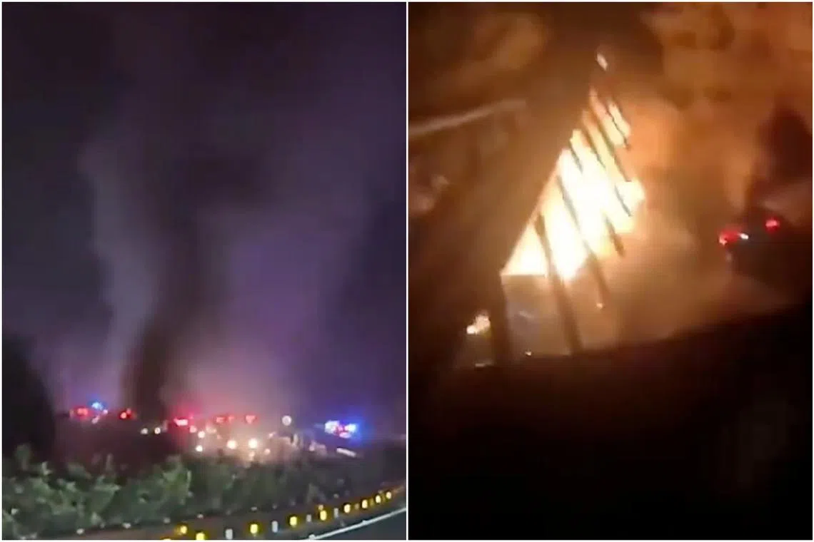 Footage shared by local news outlets showed flames and smoke emanating from a deep, dark pit that cars appeared to have plummeted into.