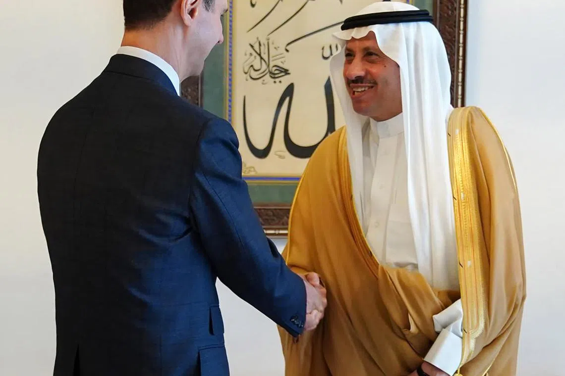 A handout photo made available by Syrian President's office shows Syrian President Bashar al-Assad (left) receiving Saudi Arabian ambassador to Jordan Nayef Al-Sudairi, in Damascus last Wednesday. 