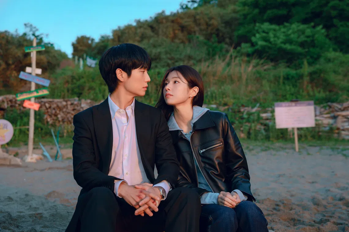 Jung Hae-in (left) as Jang Tae-ha and Ha Young as Go Eun-sae in Our Sticky Love.