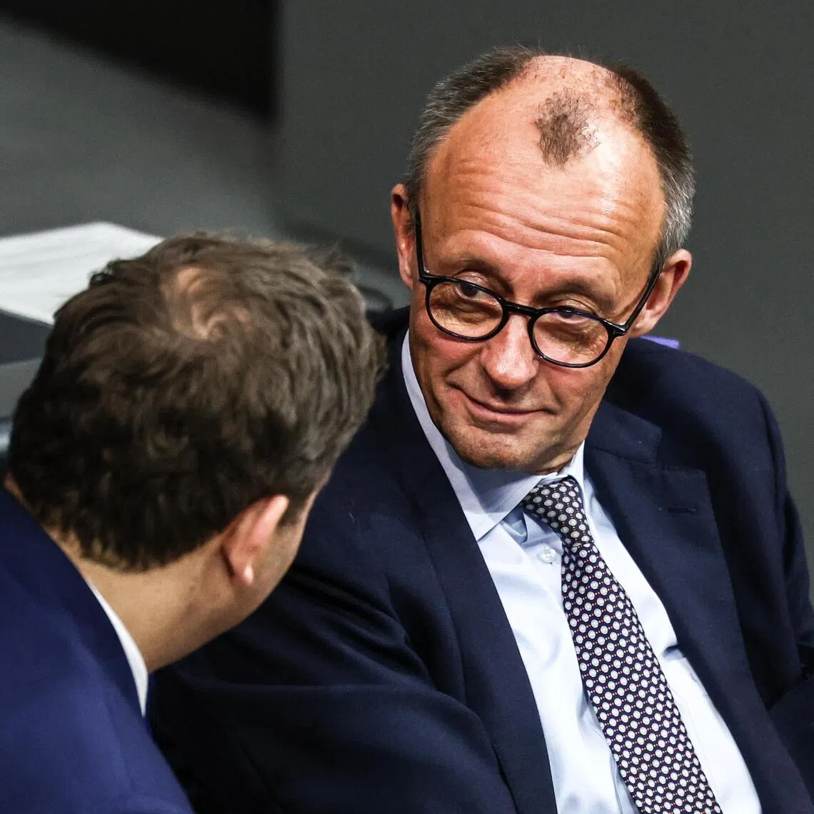 The Bill passed by 319 votes to 225 with 53 abstentions – within the range Mr Merz had called for.