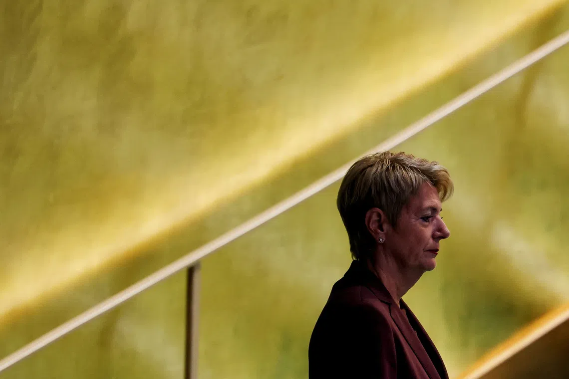 Swiss President Karin Keller-Sutter walks to the podium at U.N. headquarters in New York City, U.S., September 22, 2025. REUTERS/Mike Segar