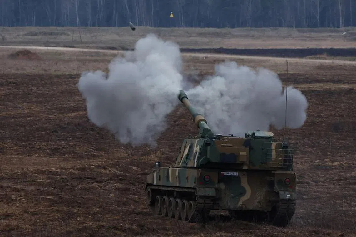 FILE PHOTO: A K9 howitzer, delivered in the first batch of arms from South Korea under contracts signed in recent months, fires during a military drill at a military range in Wierzbiny near Orzysz, Poland, March 30, 2023. REUTERS/Kacper Pempel/File Photo