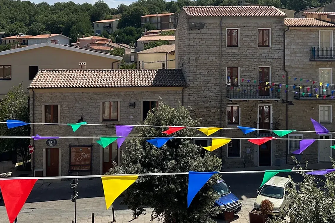 The village, located in the rural mountainous Barbagia region, now has 1,150 residents.