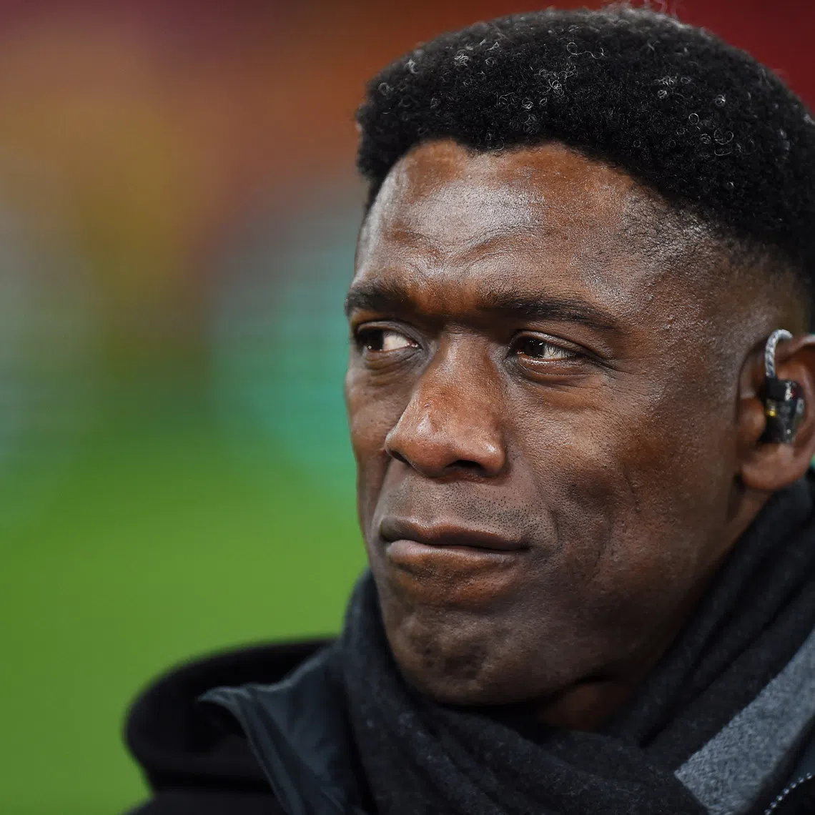 Soccer Football - Champions League - Round of 16 - Second Leg - Liverpool v Paris St Germain - Anfield, Liverpool, Britain - March 11, 2025 TV pundit and former player Clarence Seedorf before the match REUTERS/Peter Powell