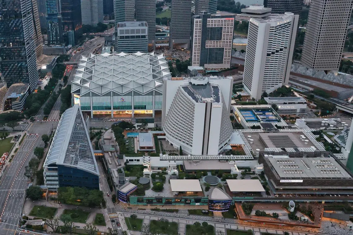 Aerial shot of Marina Square, Parkroyal Collection Marina Bay, Suntec City and Pan Pacific Singapore on June 24, 2023.