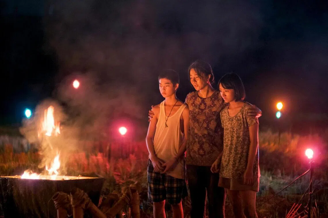 Bai Run-yin, Fan Bingbing and Natalie Hsu in the film Mother Bhumi.