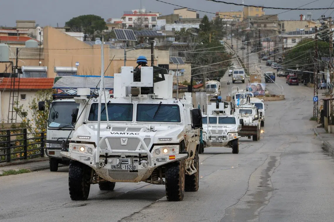 FILE PHOTO: UNIFIL vehicles drive on a main road in Qlayaa, amid escalating hostilities between Israel and Hezbollah, as the U.S.-Israel conflict with Iran continues, in Qlayaa, southern Lebanon, March 27, 2026. REUTERS/Karamallah Daher/File Photo