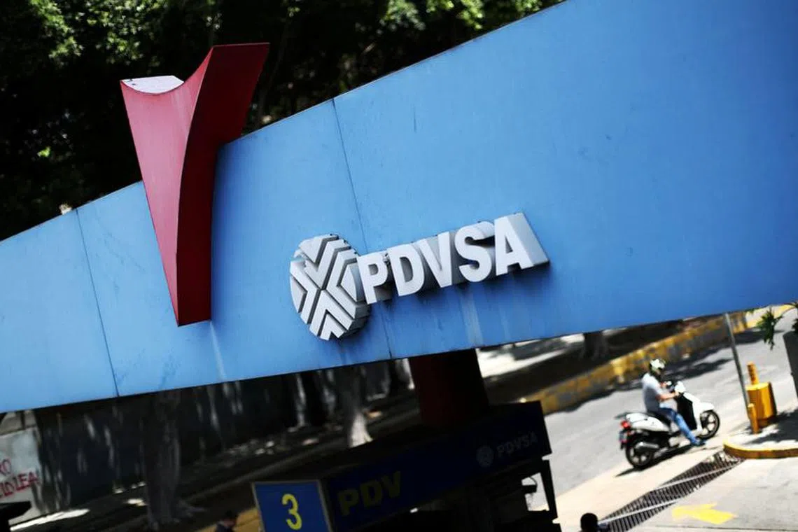 FILE PHOTO: A state oil company PDVSA's logo is seen at a gas station in Caracas, Venezuela May 17, 2019. REUTERS/Ivan Alvarado/File Photo
