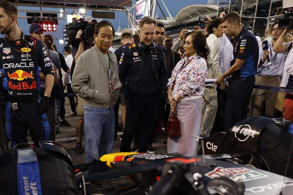 Red Bull team principal Christian Horner (middle) is seen with Thai businessman Chalerm Yoovidhya and his wife Daranee Yoovidhya after the Bahrain GP.