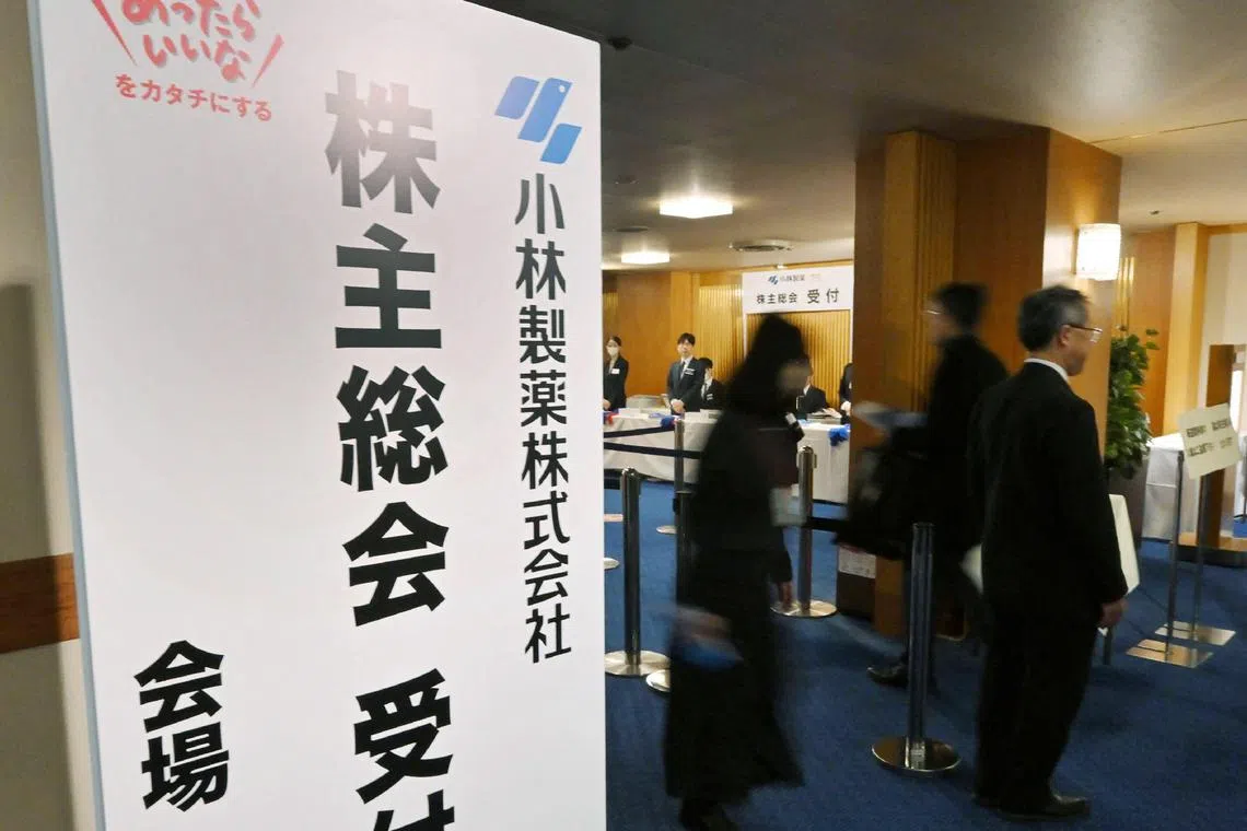People entering Kobayashi Pharmaceutical's annual general meeting of shareholders in Osaka on March 28, 2024. The Japanese drugmaker's dietary supplements are at the centre of a growing health scare.