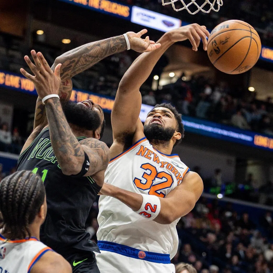 New York Knicks center/forward Karl-Anthony Towns knocks the ball loose from New Orleans Pelicans guard/forward Saddiq Bey during the second half at Smoothie King Center.