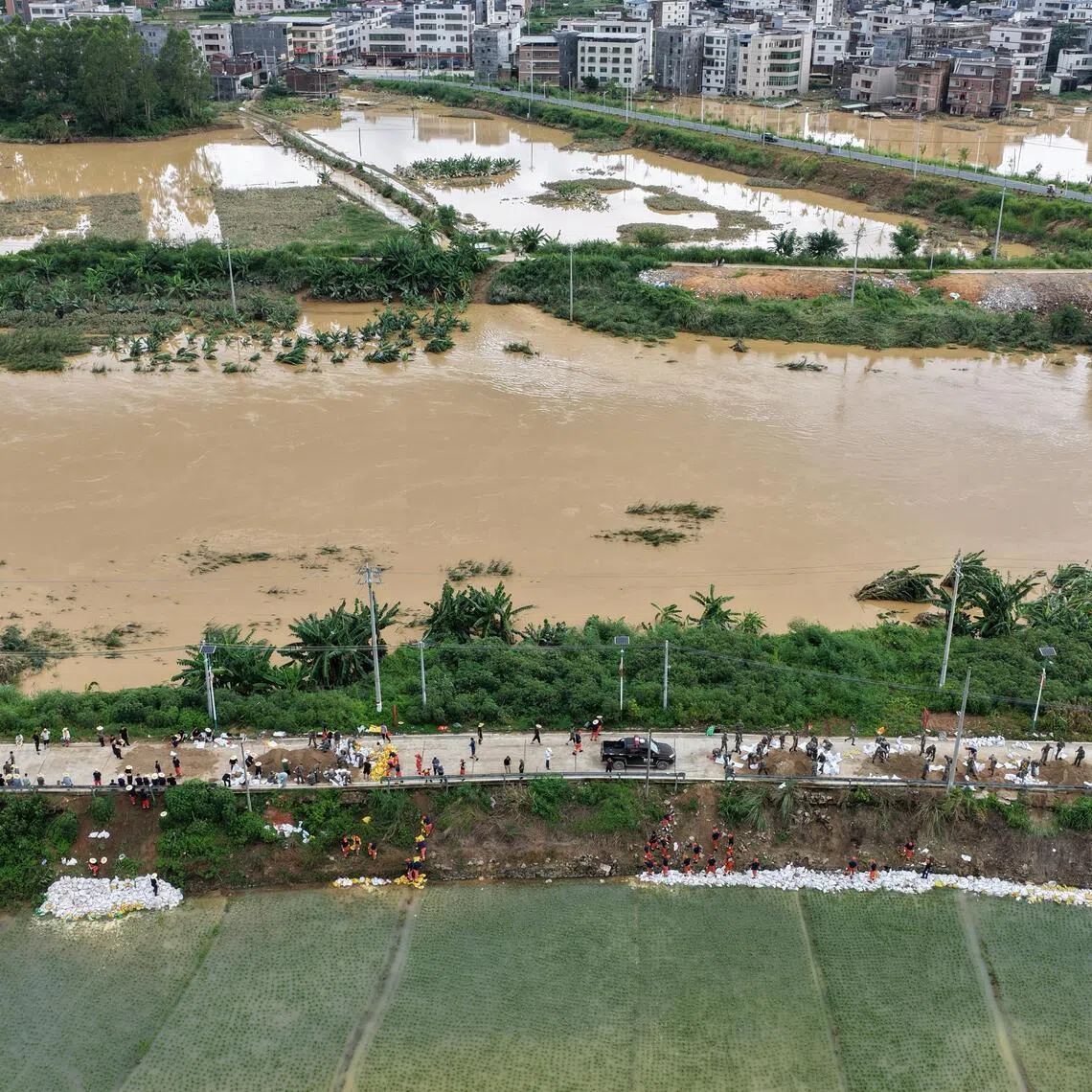 Villages are surrounded by floodwaters after heavy rainfall from Typhoon Noul, in Wuhua county, Guangdong province, China, on July 27.