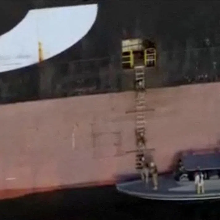 A screen capture from a video said to show the seizure of the container ships MSC Francesca and Epaminondas in the Strait of Hormuz, broadcasted on Iranian State TV, and released April 22, 2026, shows soldiers taking part in the operation. IRIB/Handout via REUTERS